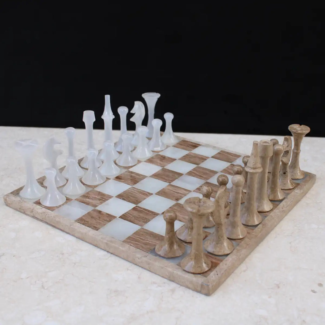 A hand-carved polished Italian onyx marble chess board set with wood case, displayed with white and beige pieces arranged on the board.