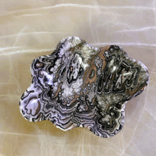 Load image into Gallery viewer, An elegant hand-carved bowl with capricious veins in beige, light brown, and dark brown tones, placed on a marble surface.
