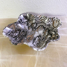 Load image into Gallery viewer, An elegant hand-carved bowl with capricious veins in beige, light brown, and dark brown tones, placed on a marble surface.
