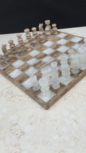 Load and play video in Gallery viewer, Hand Carved Travertine &amp; White Marble Chess Set
